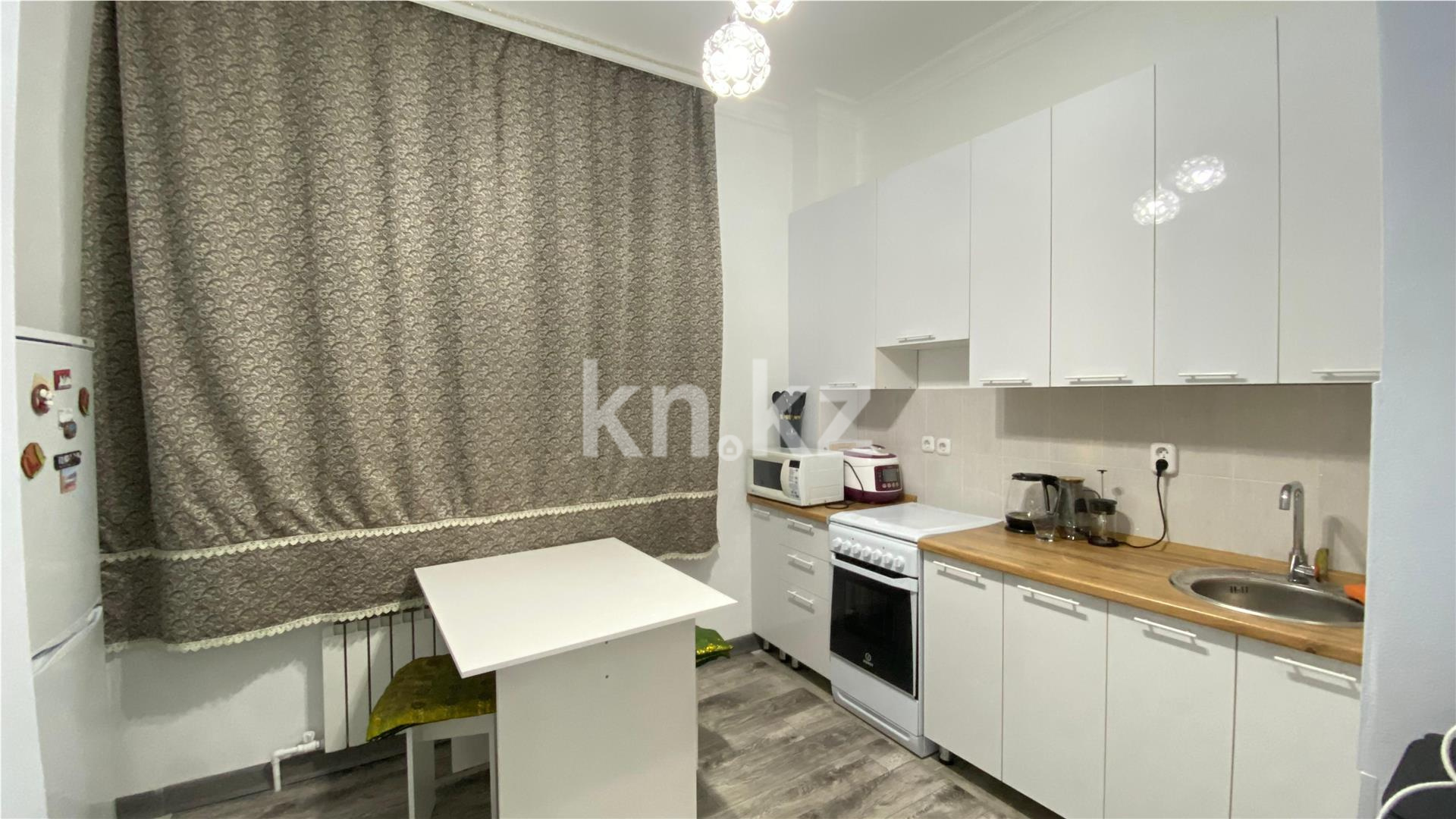 Продажа 2-комнатной квартиры, 57 м², ул. Дюсембекова - Продажа  двухкомнатных квартир в Караганде фото 5 из 10