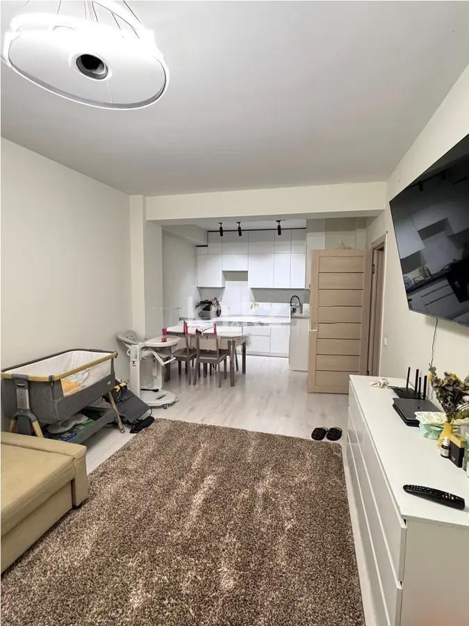 Продажа 2-комнатной квартиры, 57 м², ул. Сарыарка, дом  1/4 в Алматы - фото 3