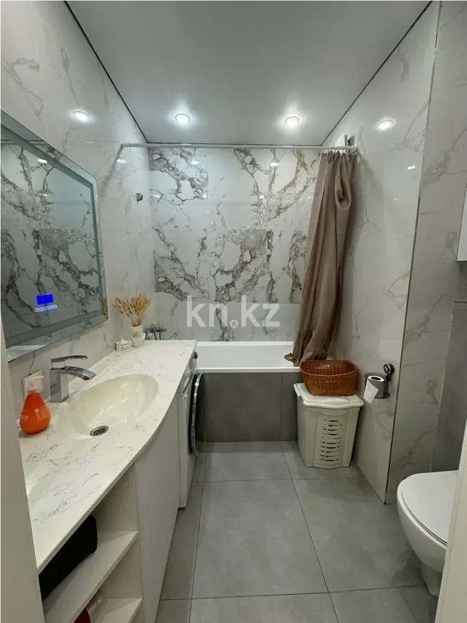 Продажа 2-комнатной квартиры, 68 м², ул. Сыганак, дом  41 в Астане - фото 4