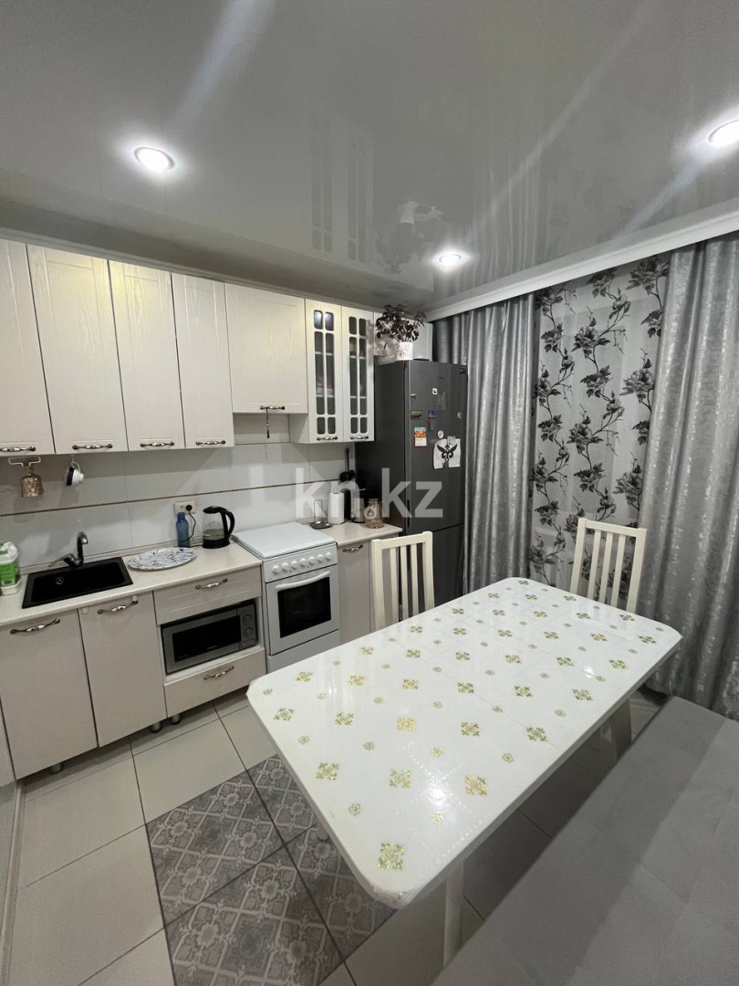 Продажа 2-комнатной квартиры, 54 м², мкр-н Голубые Пруды в Караганде - фото 5