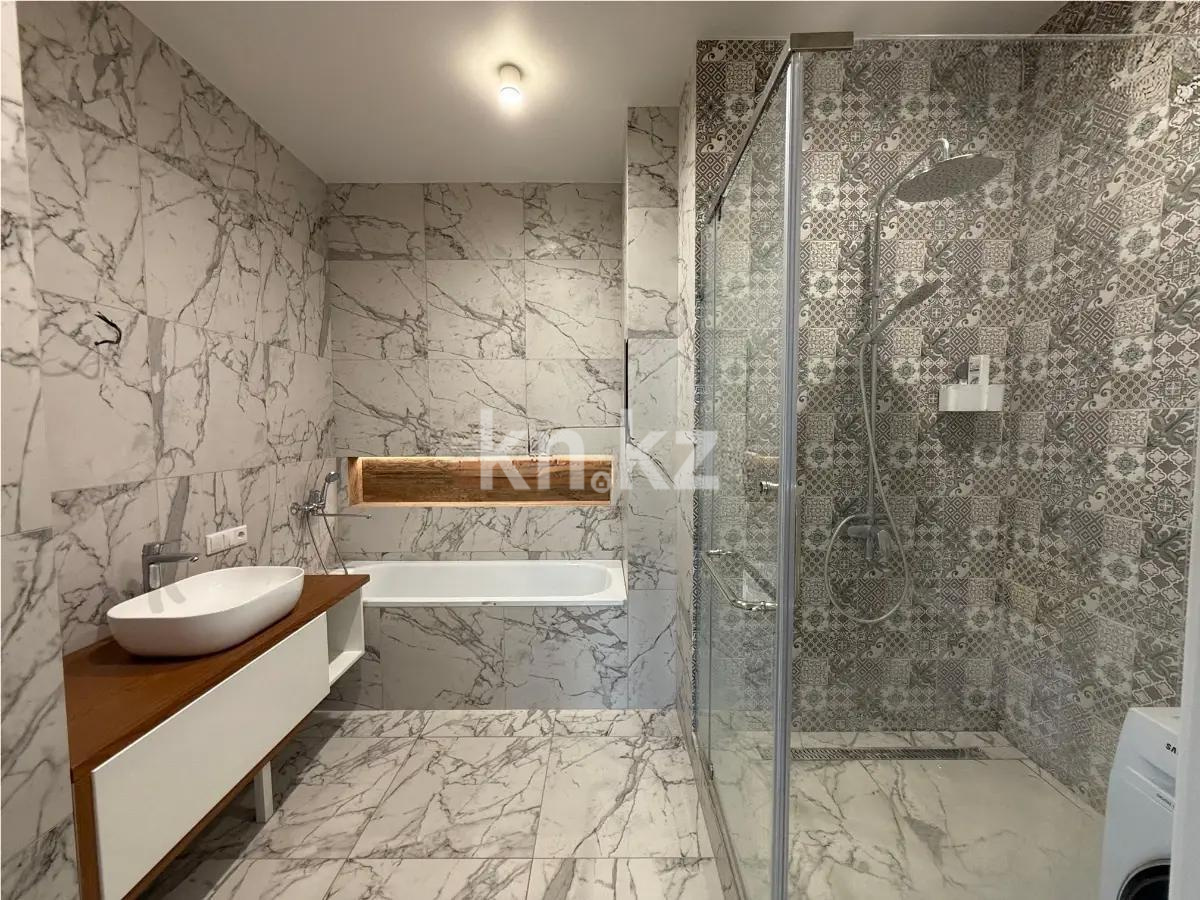 Продажа 2-комнатной квартиры, 77 м², ул. Байтурсынова, дом  29б в Астане - фото 4