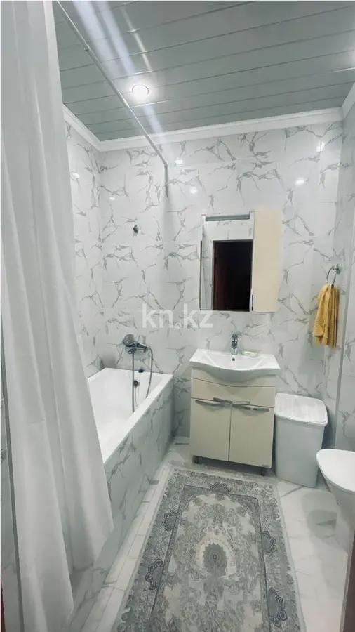 Продажа 2-комнатной квартиры, 64 м², ул. Дукенулы, дом  38 в Астане - фото 4