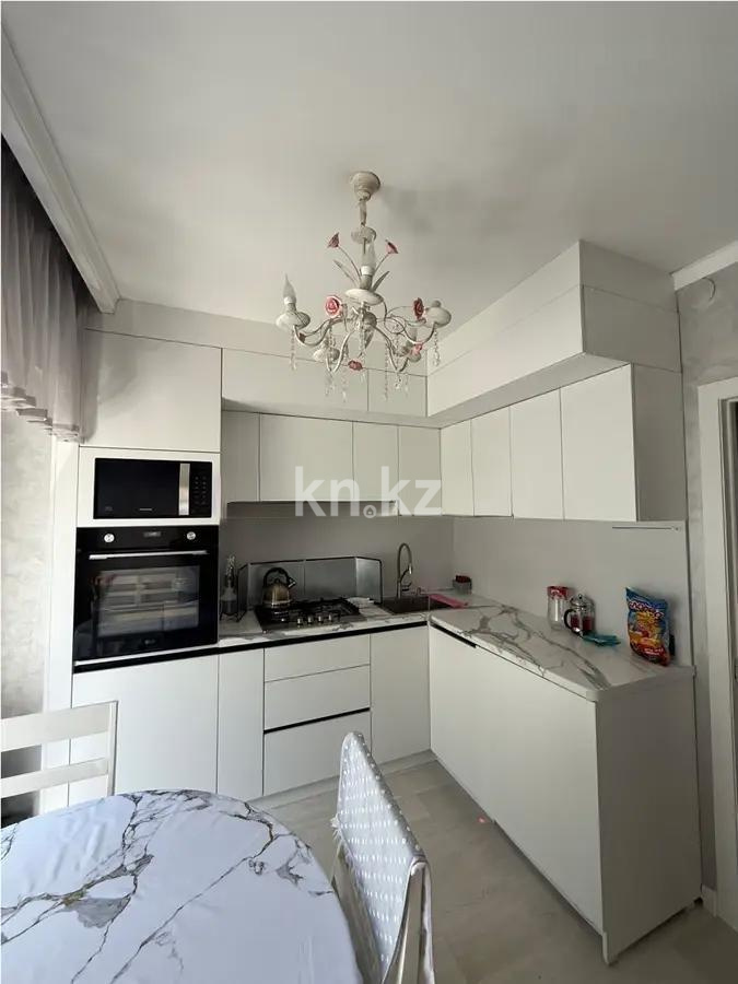 Продажа 1-комнатной квартиры, 38 м², мкр-н 5, дом  2А в Алматы - фото 2