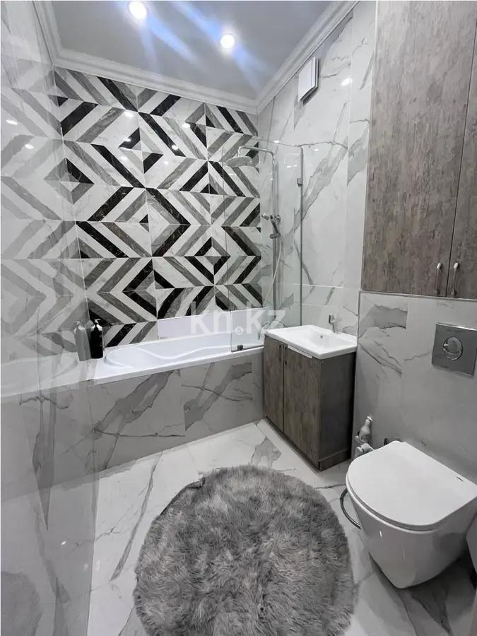 Продажа 4-комнатной квартиры, 122 м², ул. Тыныбаева, дом  7 в Астане - фото 6