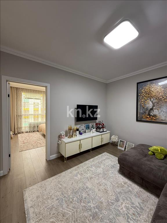 Продажа 2-комнатной квартиры, 52 м², ул. Толе би, дом  285/8 к13 - ул. Утеген батыра в Алматы - фото 5