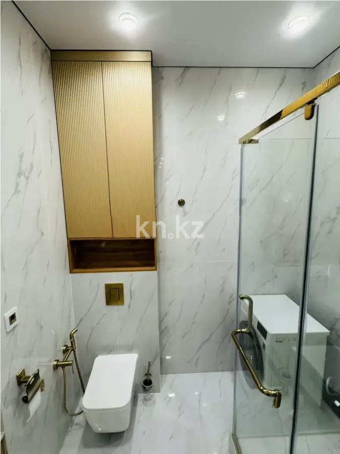 Продажа 4-комнатной квартиры, 110 м², ул. Сыганак, дом  28 в Астане - фото 4