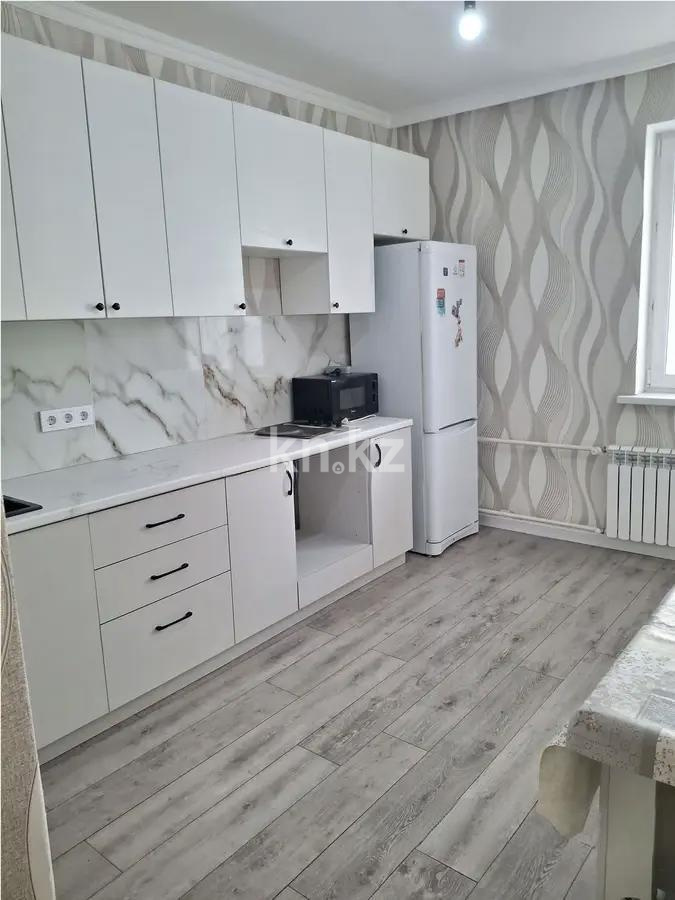 Продажа 1-комнатной квартиры, 48 м², ул. Омарова, дом  3/1 в Астане - фото 2