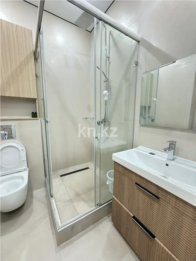 Продажа 2-комнатной квартиры, 65 м², ул. Бокейхана, дом  52 в Астане - фото 4