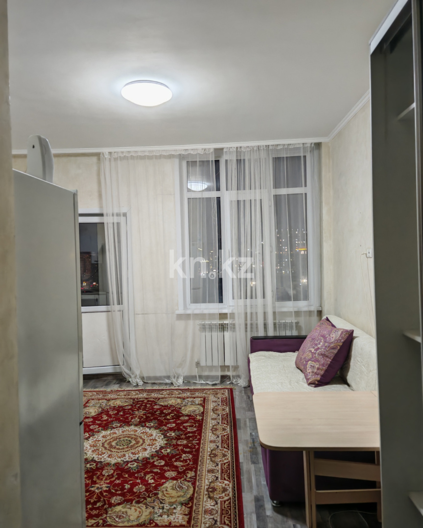 Продажа 1-комнатной квартиры, 27 м², ул. Омарова, дом  27 в Астане - фото 5
