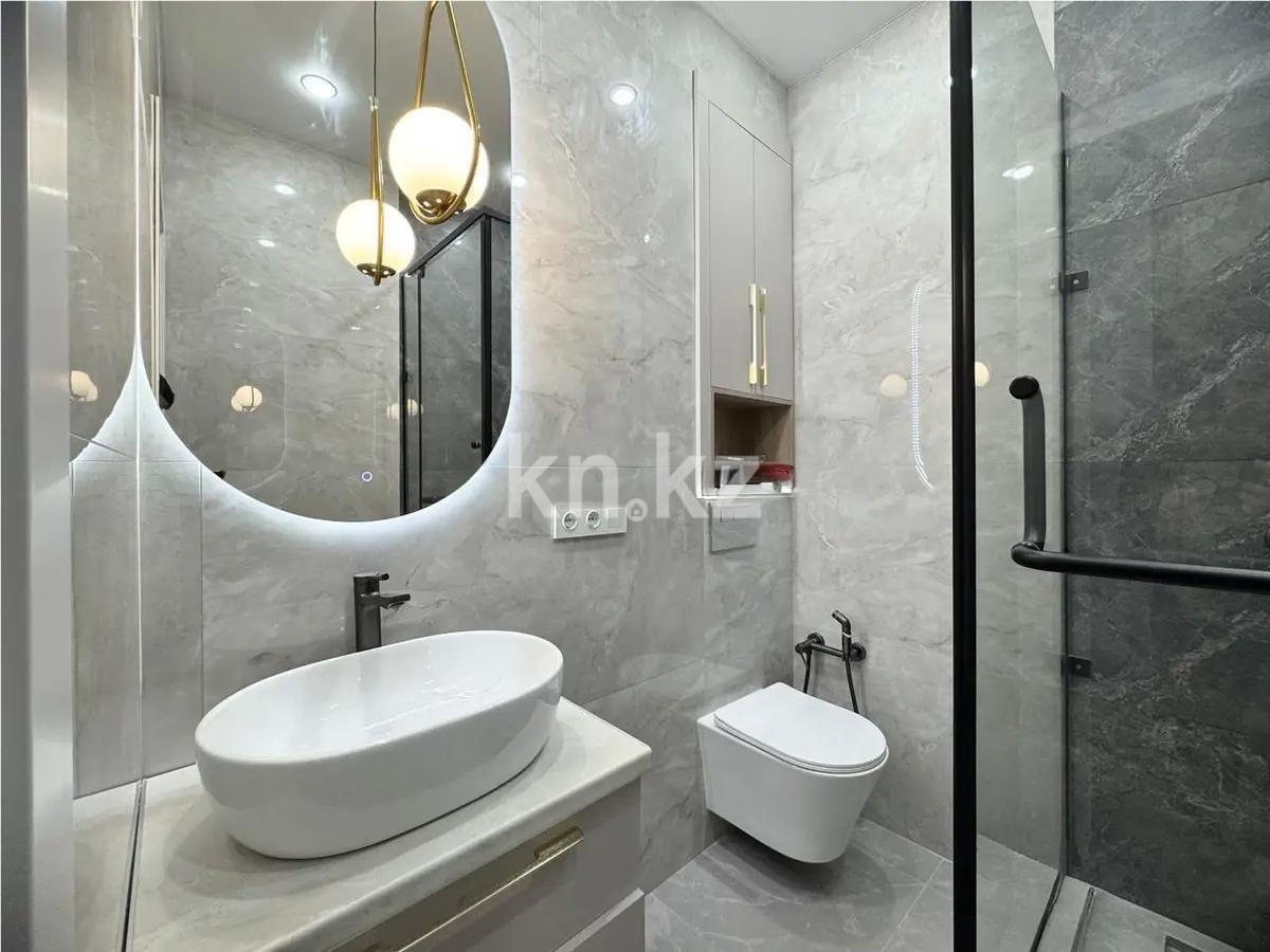 Продажа 2-комнатной квартиры, 51 м², ул. Сыганак, дом  32 в Астане - фото 4