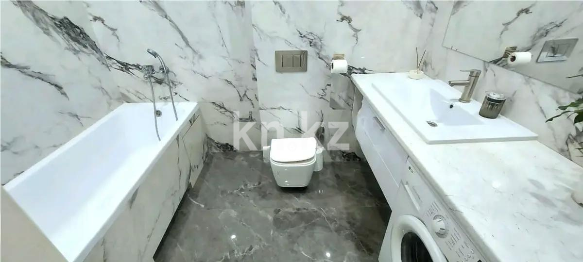 Продажа 2-комнатной квартиры, 50 м², ул. Толе би, дом  12 в Астане - фото 3