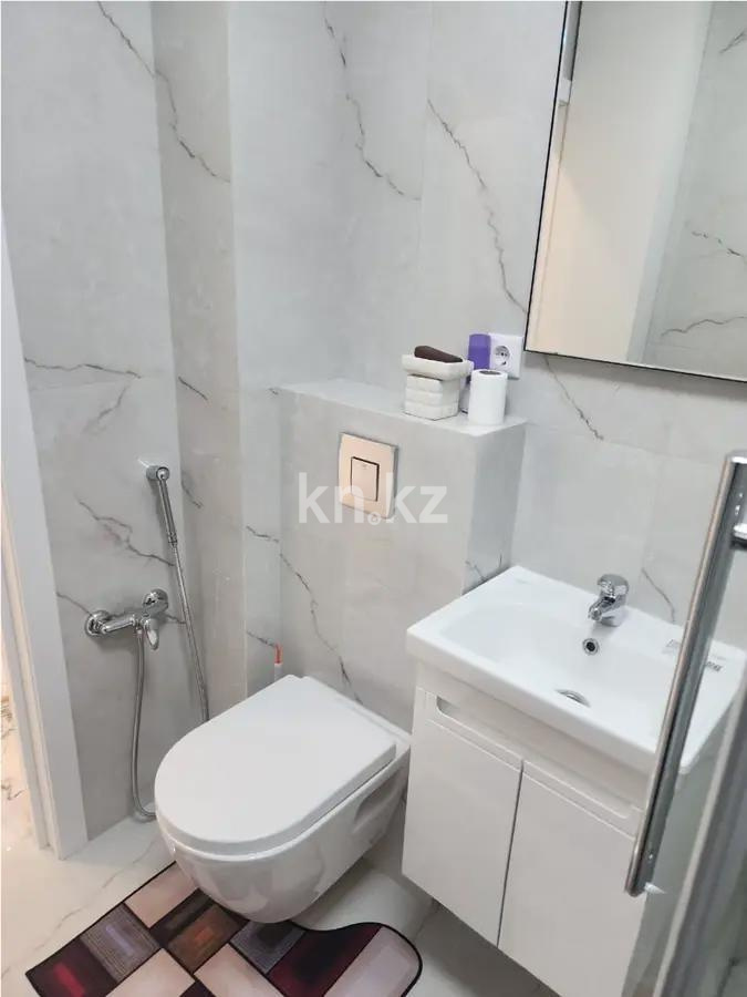 Продажа 1-комнатной квартиры, 50 м², ул. Момышулы, дом  26/2 в Караганде - фото 4