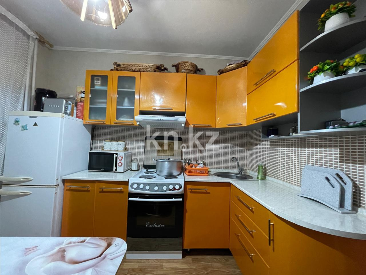 Продажа 3-комнатной квартиры, 63 м², мкр-н Гульдер-1 в Караганде - фото 9