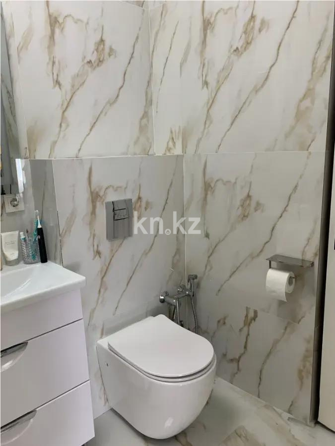 Продажа 2-комнатной квартиры, 68 м², ул. Толе би, дом  48/1 в Астане - фото 4