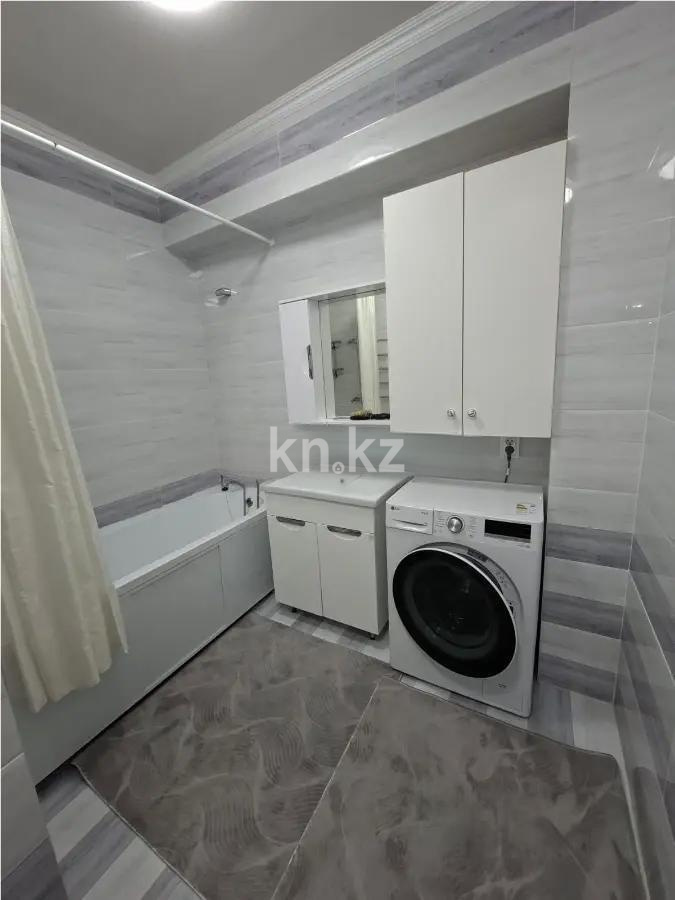 Продажа 2-комнатной квартиры, 68 м², ул. Сыганак, дом  14 в Астане - фото 5