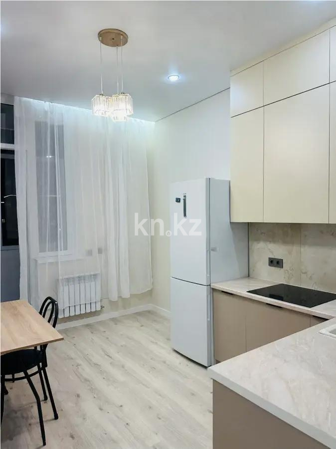 Продажа 2-комнатной квартиры, 45 м², ул. Толе би, дом  25/1 в Астане - фото 2