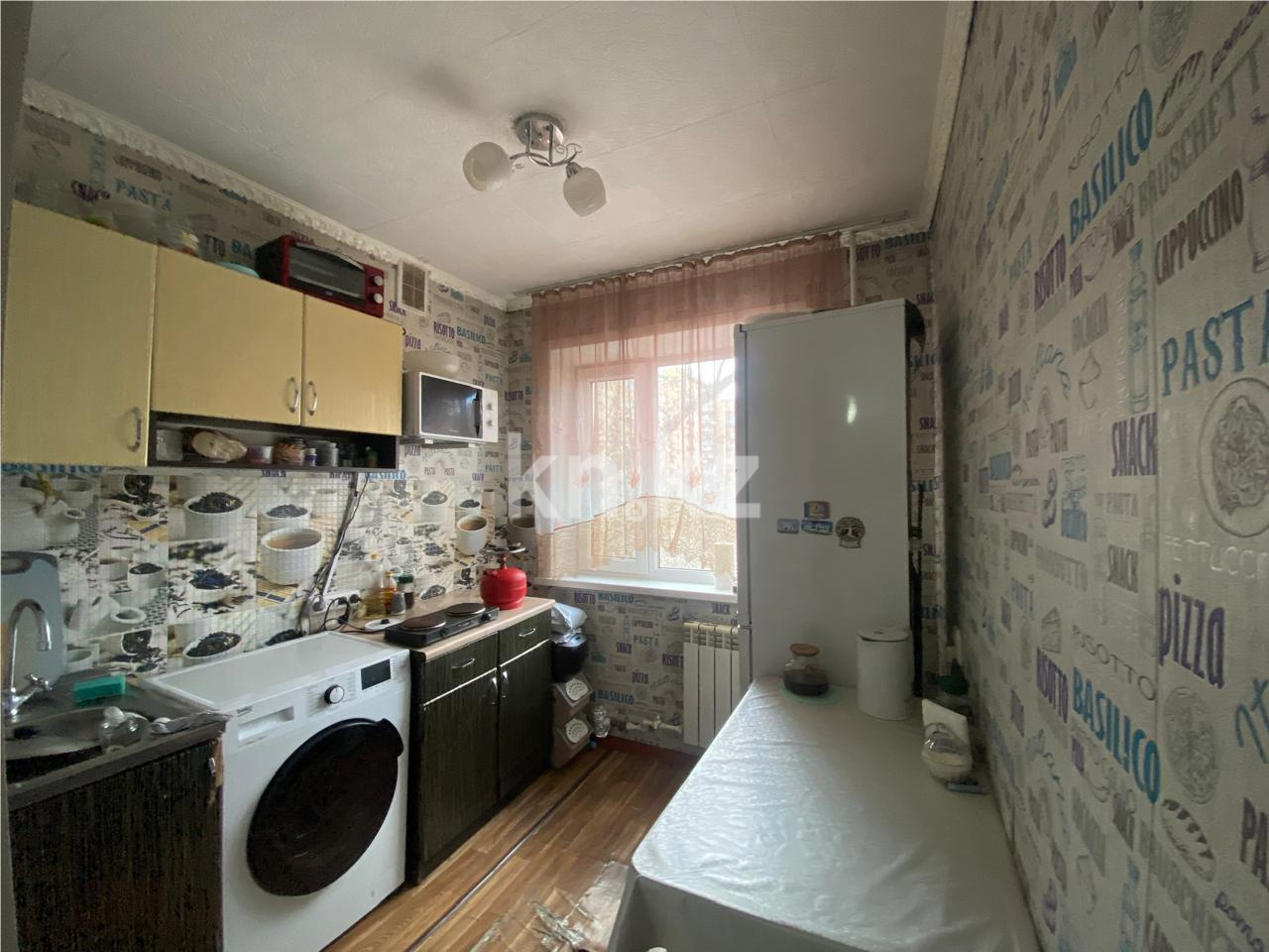 Продажа 1-комнатной квартиры, 31 м², мкр-н 11а, дом  18 в Караганде - фото 4