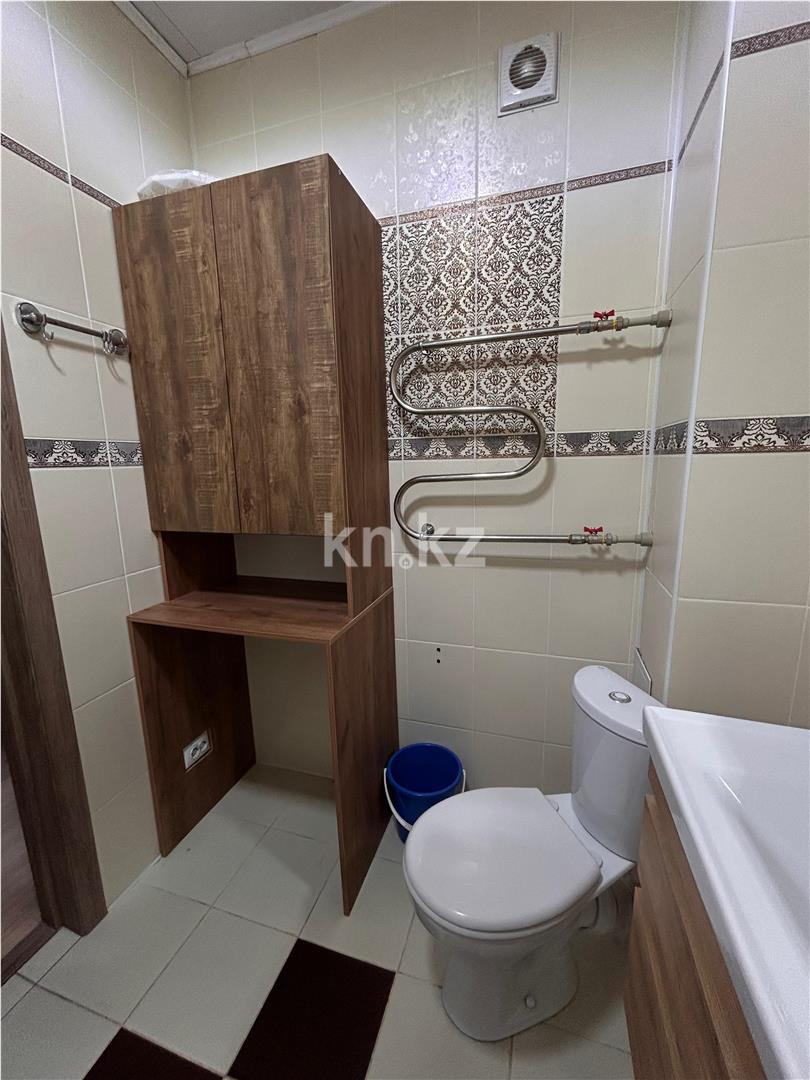 Продажа 2-комнатной квартиры, 55 м², ул. Сатпаева в Астане - фото 11