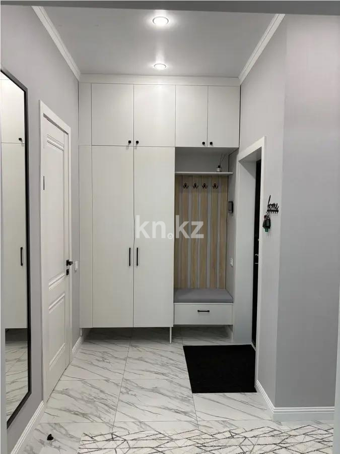 Продажа 2-комнатной квартиры, 61 м², ул. Омарова, дом  2/1 в Астане - фото 5