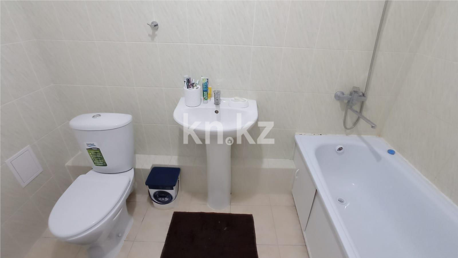 Продажа 2-комнатной квартиры, 65 м², ул. Аманжолова в Астане - фото 8