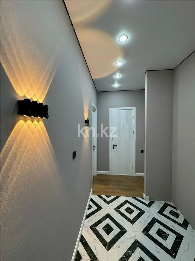 Продажа 1-комнатной квартиры, 49 м², ул. Толе би, дом  12/1 в Астане - фото 4