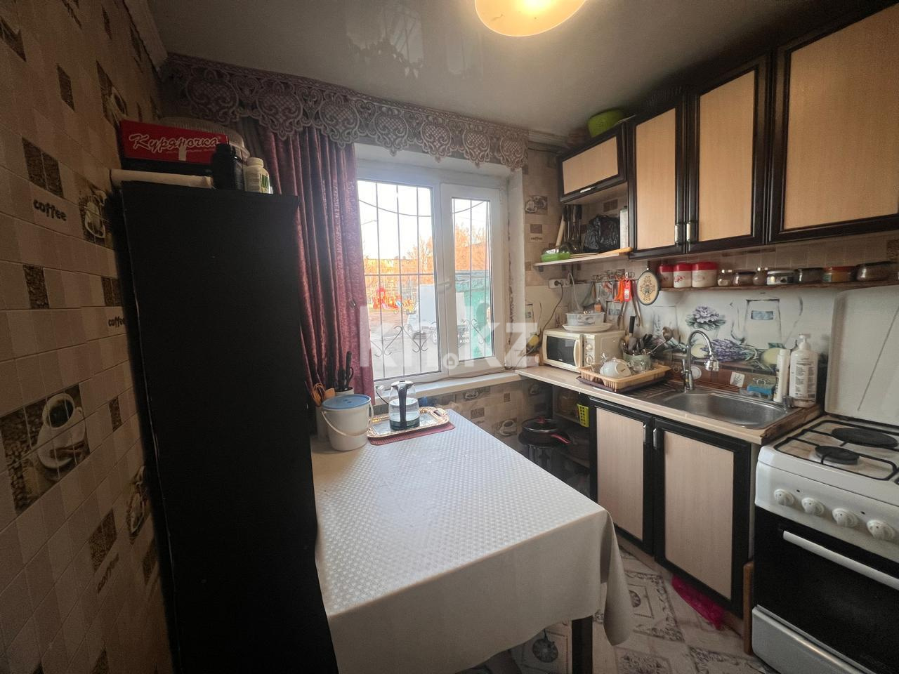 Продажа 3-комнатной квартиры, 61 м², 18 мкр., дом  22 в Караганде - фото 7