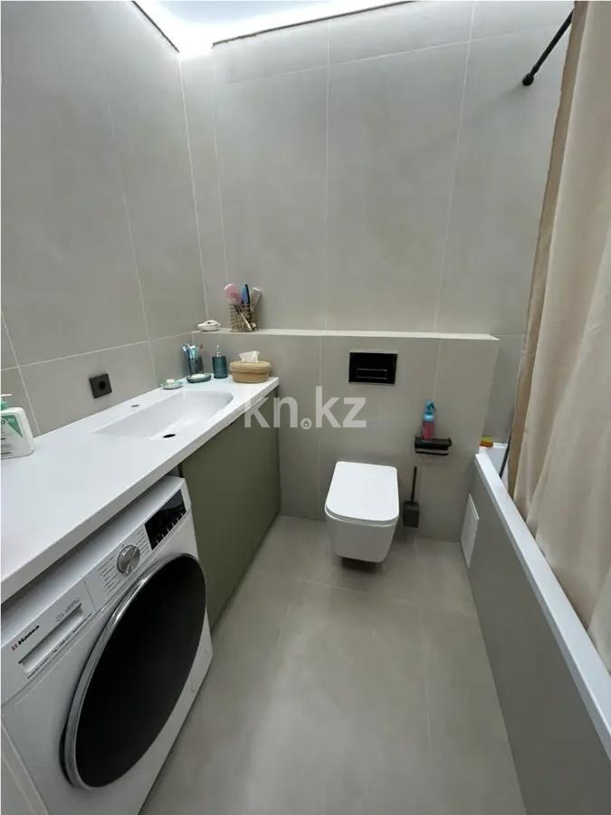 Продажа 2-комнатной квартиры, 58 м², ул. Толе би, дом  28/1 в Астане - фото 4