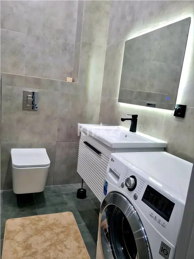 Продажа 2-комнатной квартиры, 50 м², ул. Толе би, дом  63 в Астане - фото 4