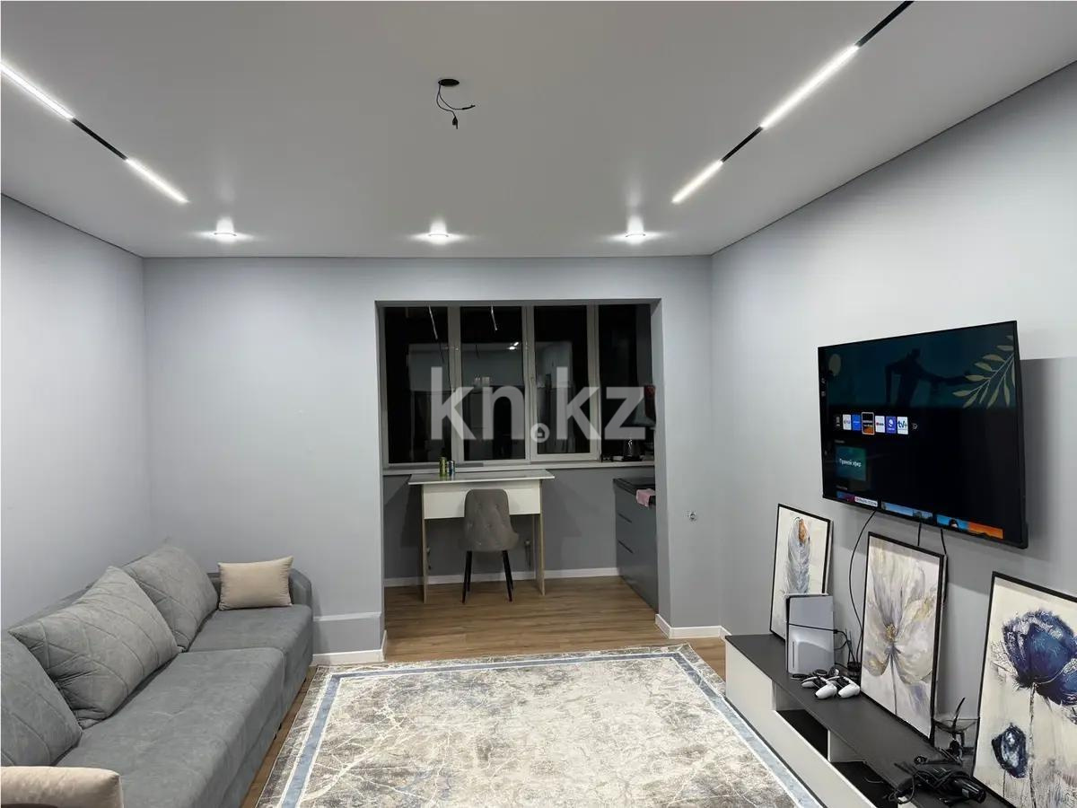 Продажа 1-комнатной квартиры, 52 м², мкр-н Аксай-1а, дом  28 - Продажа  однокомнатных квартир в новостройках Алматы фото 1 из 5