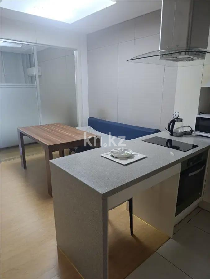 Продажа 1-комнатной квартиры, 42 м², пр. Кошкарбаева, дом  10/1 в Астане - фото 2