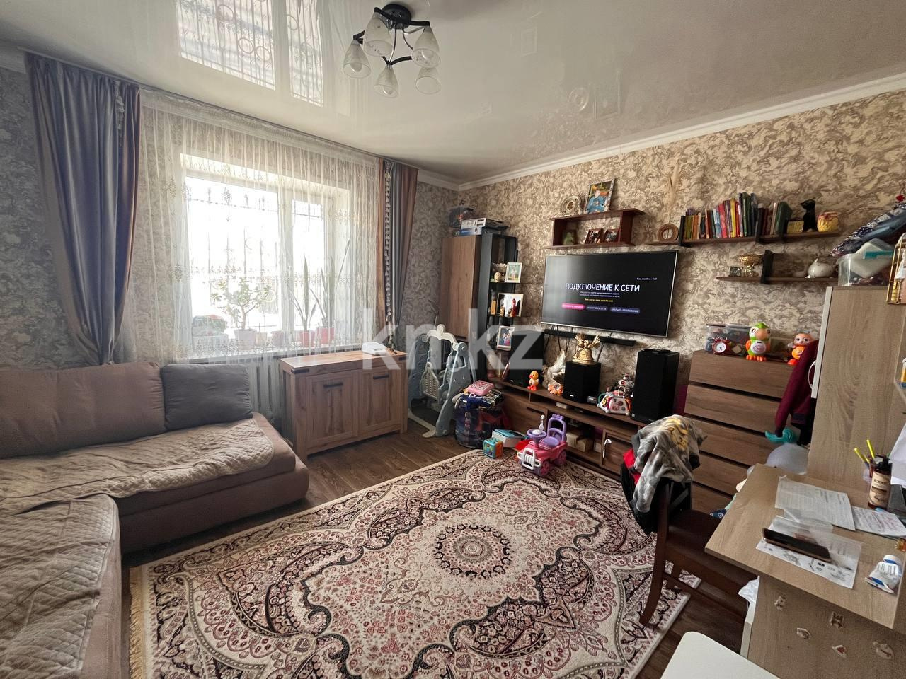 Продажа 2-комнатной квартиры, 56 м², ул. Гвардейская, дом  20 в Караганде - фото 2