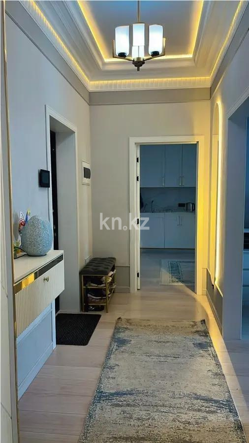 Продажа 2-комнатной квартиры, 60 м², ул. Омарова, дом  2/1 в Астане - фото 5