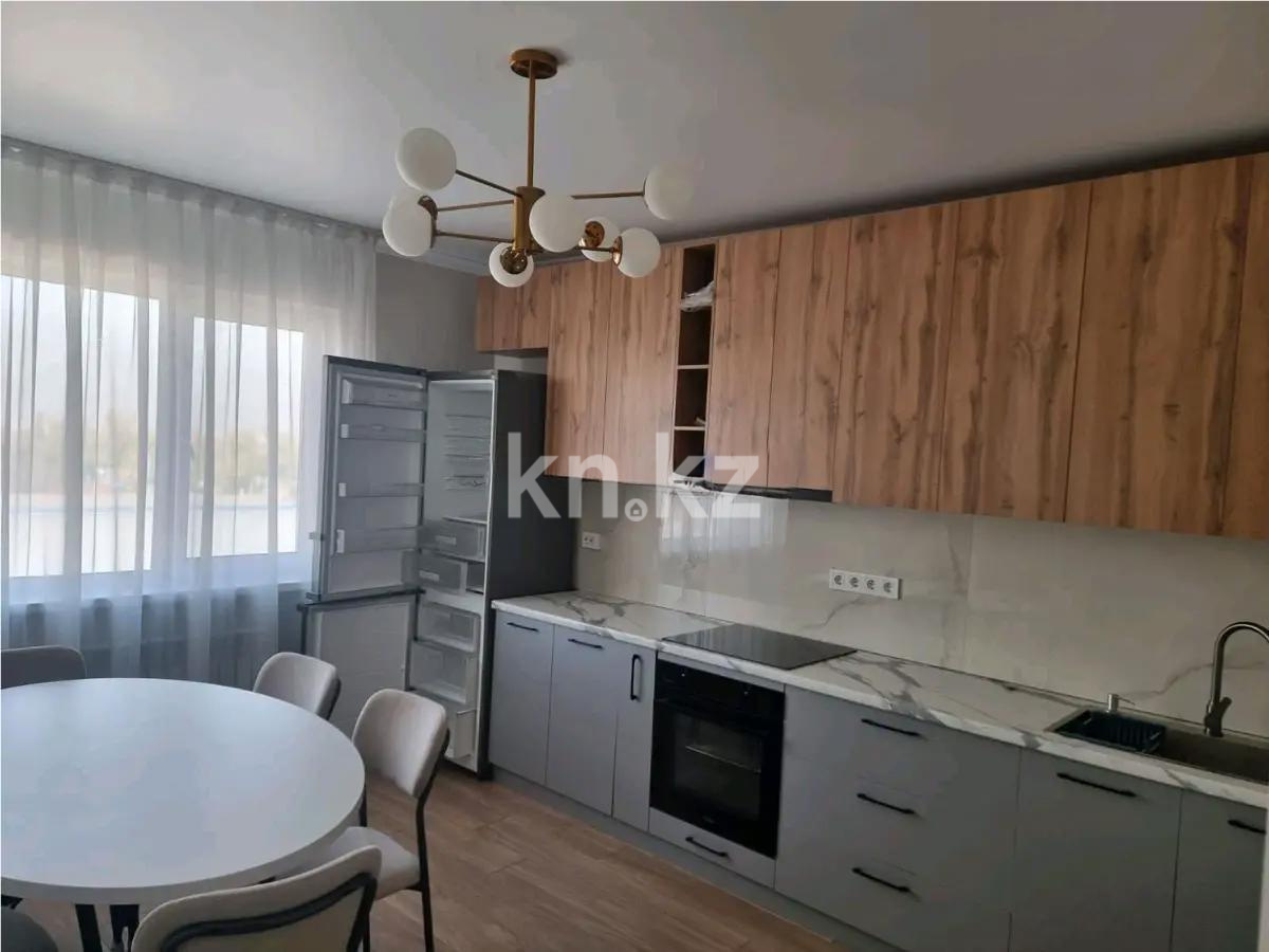 Продажа 2-комнатной квартиры, 62 м², ул. Толе би, дом  285/8 в Алматы - фото 2