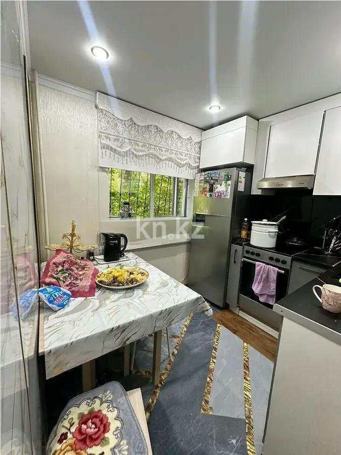 Продажа 3-комнатной квартиры, 57 м², 12 мкр., дом  45 в Караганде - фото 4