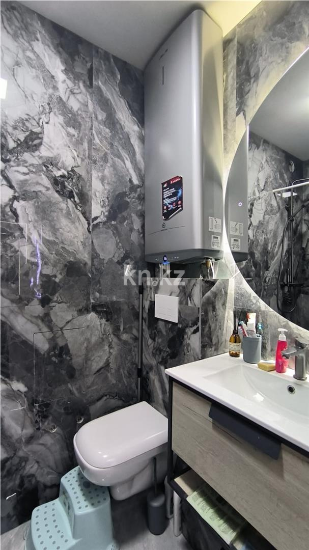 Продажа 4-комнатной квартиры, 107 м², ул. Муканова в Караганде - фото 14