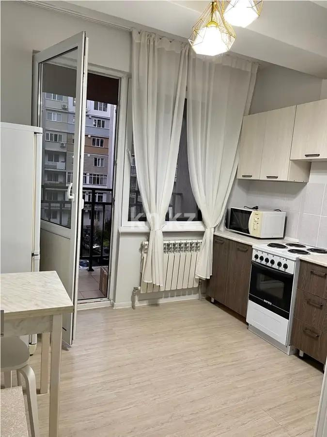 Продажа 1-комнатной квартиры, 36 м², Кульджинский тракт, дом  16/40 в Алматы - фото 2
