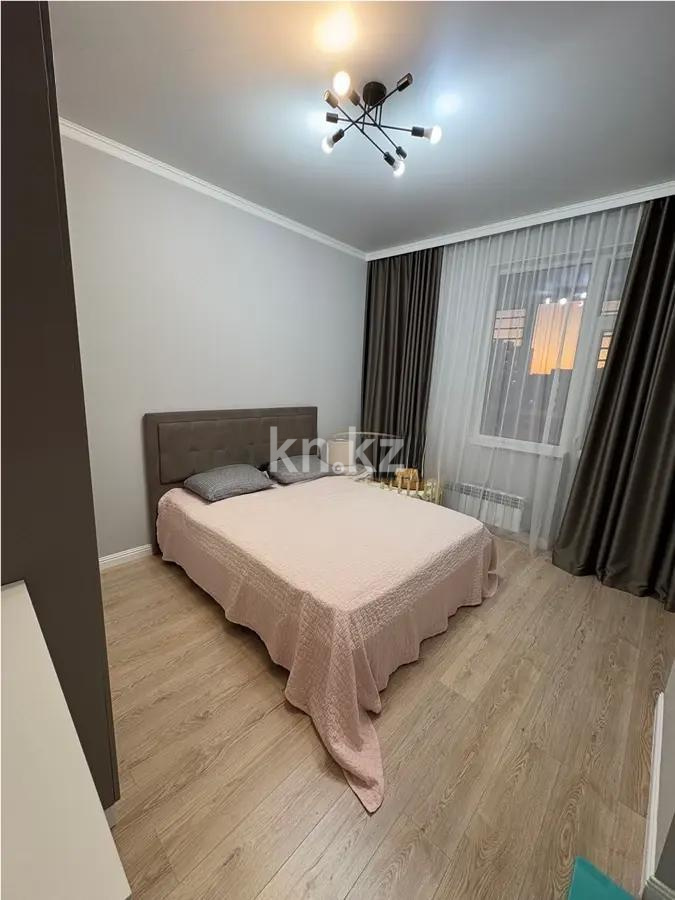 Продажа 2-комнатной квартиры, 61 м², ул. Омарова, дом  2/1 в Астане - фото 2