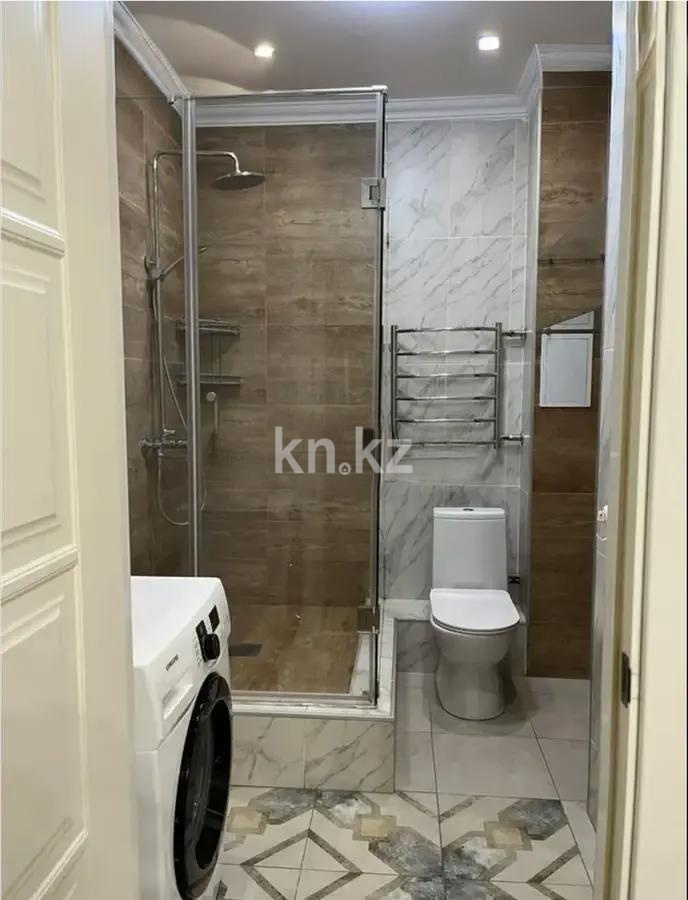 Продажа 2-комнатной квартиры, 63 м², ул. Курмангазы, дом  97 в Алматы - фото 2