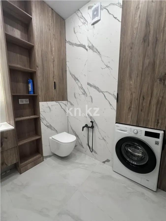 Продажа 2-комнатной квартиры, 56 м², ул. Тыныбаева, дом  18 в Астане - фото 5