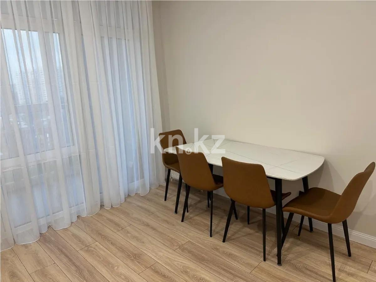 Продажа 2-комнатной квартиры, 69 м², ул. Тургута Озала, дом  194 в Алматы - фото 2