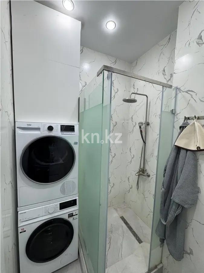 Продажа 2-комнатной квартиры, 55 м², ул. Казыбек би, дом  37 в Астане - фото 4