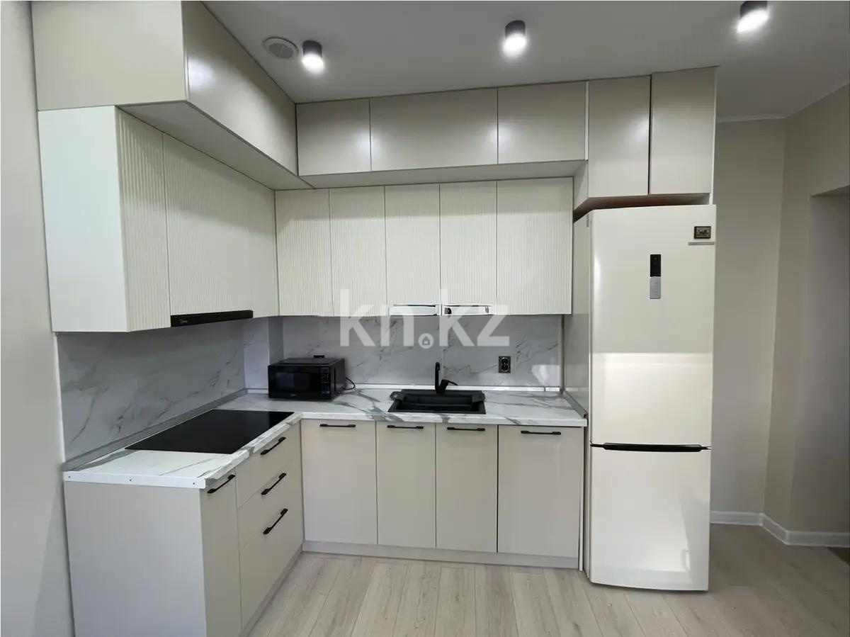 Продажа 1-комнатной квартиры, 40 м², мкр-н Куаныш, дом  17 в Алматы - фото 2