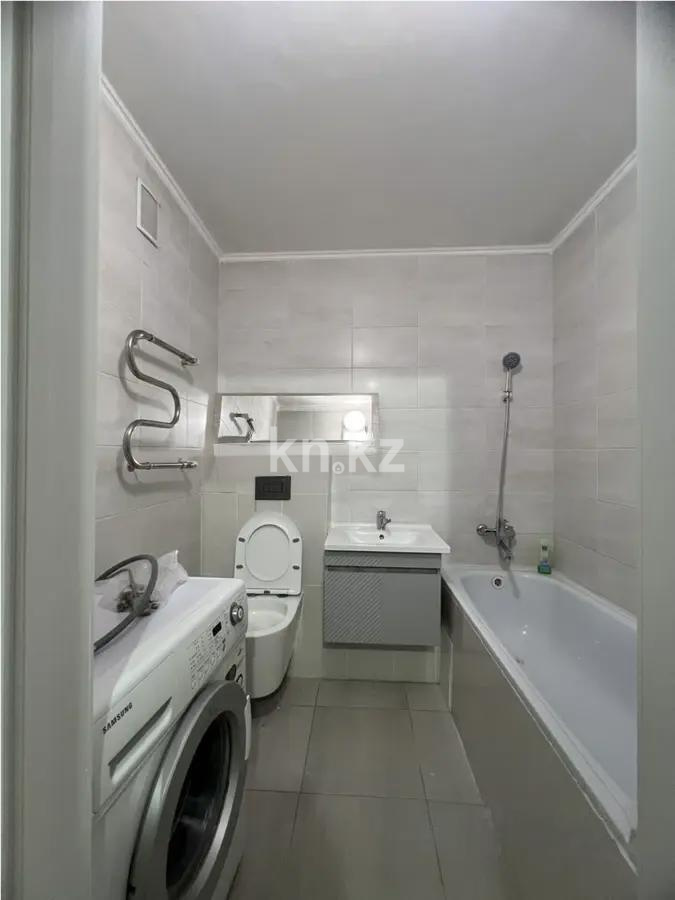 Продажа 2-комнатной квартиры, 51 м², пр. Кошкарбаева, дом  60 в Астане - фото 4