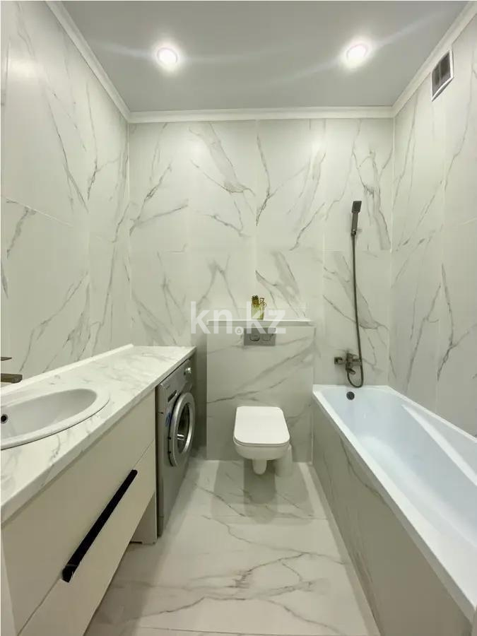 Продажа 2-комнатной квартиры, 58 м², ул. Толе би, дом  16 в Астане - фото 3