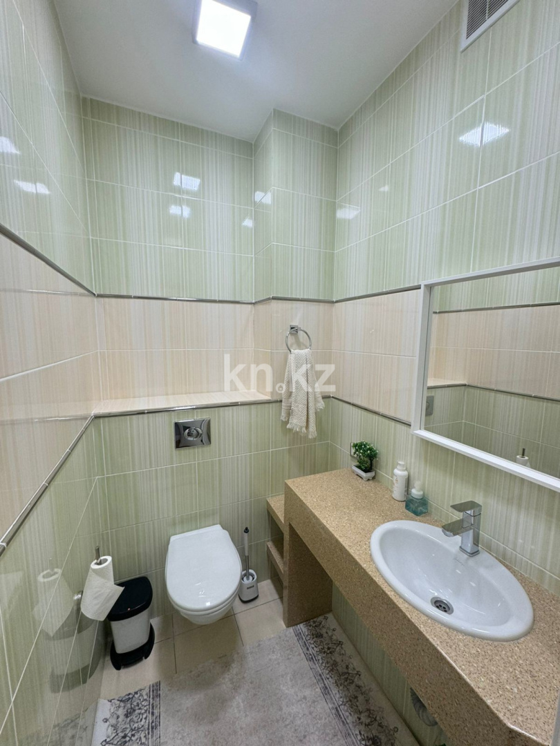 Продажа 3-комнатной квартиры, 132 м², ул. Сыганак в Астане - фото 25