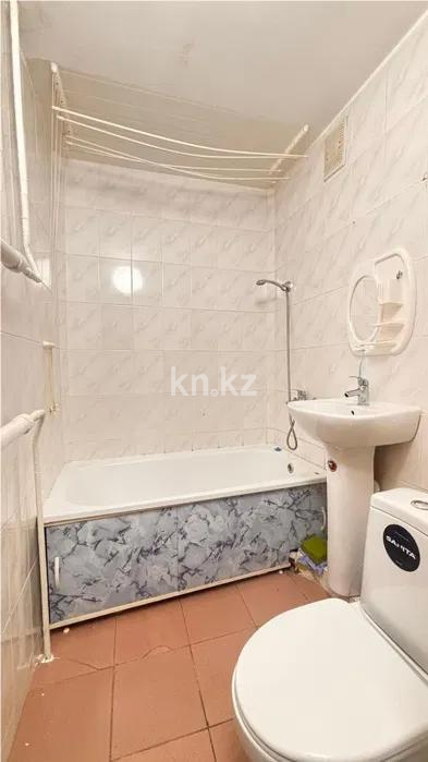 Продажа 1-комнатной квартиры, 31 м², ул. Омарова, дом  64 в Астане - фото 3
