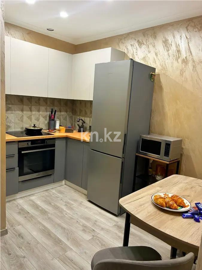 Продажа 2-комнатной квартиры, 55 м², ул. Толе би, дом  189/3 в Алматы - фото 3 Продажа 2-комнатной квартиры, 55 м², ул. Толе би, дом  189/3 в Алматы - фото 3