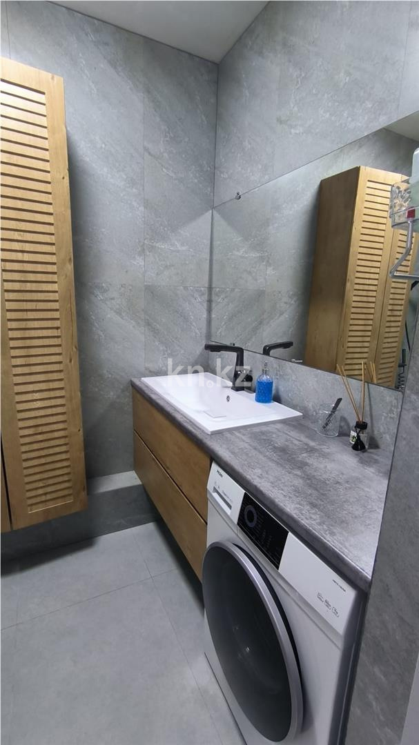 Продажа 4-комнатной квартиры, 107 м², ул. Муканова в Караганде - фото 16