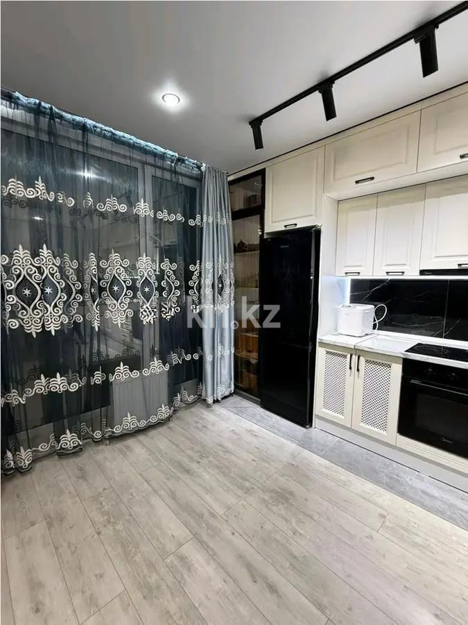 Продажа 2-комнатной квартиры, 64 м², ул. Толе би, дом  285/8 стр в Алматы - фото 2