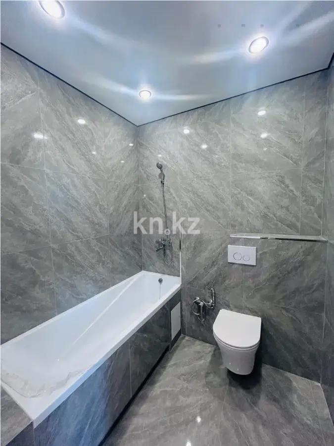 Продажа 2-комнатной квартиры, 56 м², ул. Толе би, дом  30 в Астане - фото 3